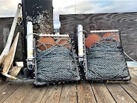 Bottom-Stowed Ropeless Fishers