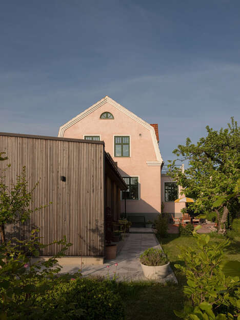 Larch-Clad Villa Extensions