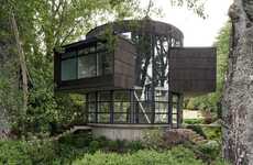 Round Glass-Wrapped Lakeside House