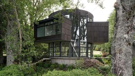 Round Glass-Wrapped Lakeside House