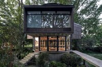 Round Glass-Wrapped Lakeside House Image 2