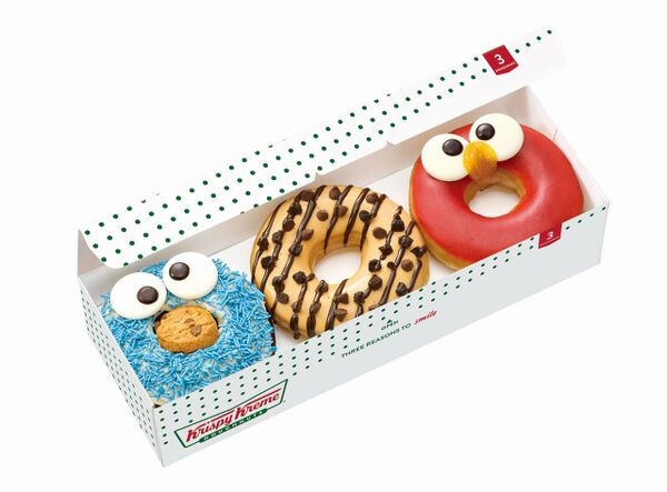 Memphis RedBirds mascot and Ron ~ loving some Krispy Kreme