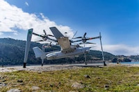 VTOL-Supporting Drone Systems
