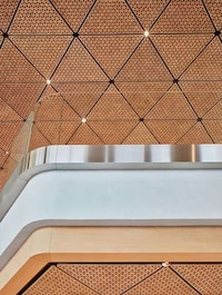 Timber-Clad Mumbai Tech Stores Image 4