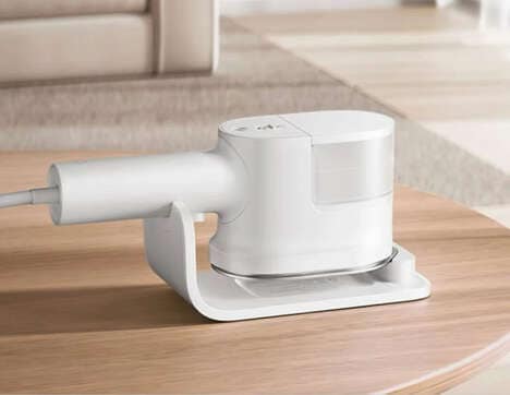 Pressurized Steam-Equipped Clothing Irons