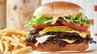 Towering Triple Patty Burgers Image 1