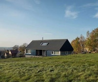 Contemporary Wooden Blue Cabins Image 2