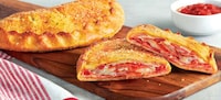 Garlicky Folded Pizza Pockets Image 1