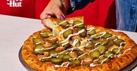 Pickle-Topped Ranch Pizzas Image 1