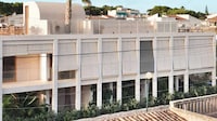 Wooden Blind-Enclosed Spanish Homes Image 3