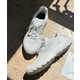 Muted Dynamic Collaborative Footwear Image 1