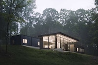 Sloped Dark Wooden Homes Image 1