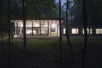 Sloped Dark Wooden Homes Image 2