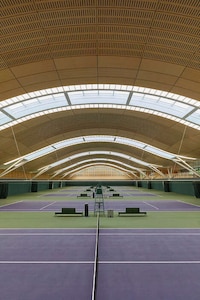Racket-Inspired Tennis Centers