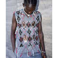 Distressed Luxury Knitwear - Maison Margiela's Distressed Wool Sweater Vest is Extravagant (TrendHunter.com)