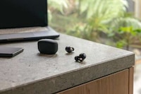 Compact Proprietary Processor Earbuds Image 6
