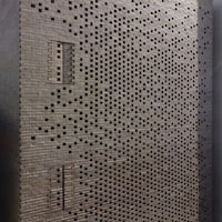 Perforated Facade Urban Home