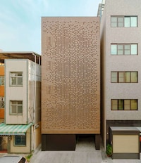 Perforated Facade Urban Home Image 2