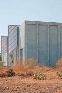 Exposed Concrete Factory Structures Image 2