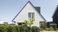 Oversized Roof Lime-Washed Homes Image 1