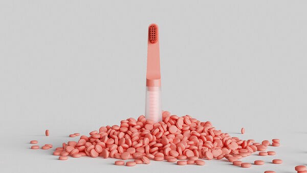 Toothpaste-Dispensing Toothbrushes