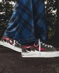 Collaborative Camo-Detailed Sneakers Image 1
