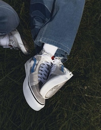 Collaborative Camo-Detailed Sneakers Image 3