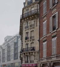 Steel-Cladded Social Housing Image 2