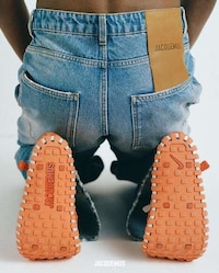 Orange-Tinged Collaborative Footwear Image 1