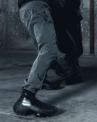 Stealthy All-Black Collaborative Boots Image 1