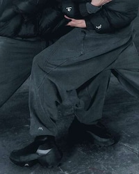 Stealthy All-Black Collaborative Boots Image 2