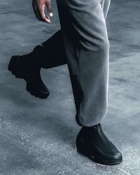 Stealthy All-Black Collaborative Boots Image 4