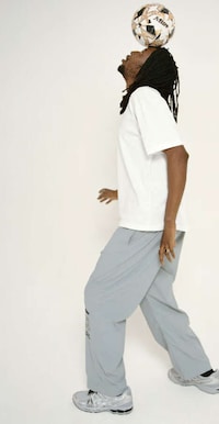 Traditional Football-Themed Fashion Image 2