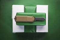 Tactical Titanium-Coated Pocket Knives Image 2