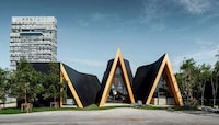 Gabled Blackened Wooden Cafes Image 1