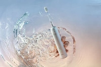 Dual-Action Electric Toothbrushes Image 2