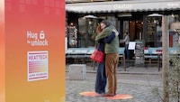 Hug-Activated Marketing Machines
