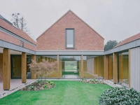 River-Overlooking Red-Brick Homes Image 1