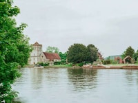 River-Overlooking Red-Brick Homes Image 3