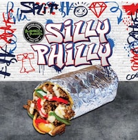 Queso-Drenched Steak Burritos Image 1