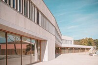 Low-Lying Limestone-Clad Schools Image 3