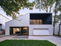 Sculptural Juxtaposing Suburban Homes