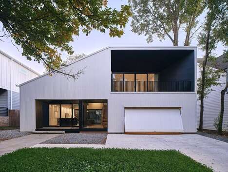 Sculptural Juxtaposing Suburban Homes