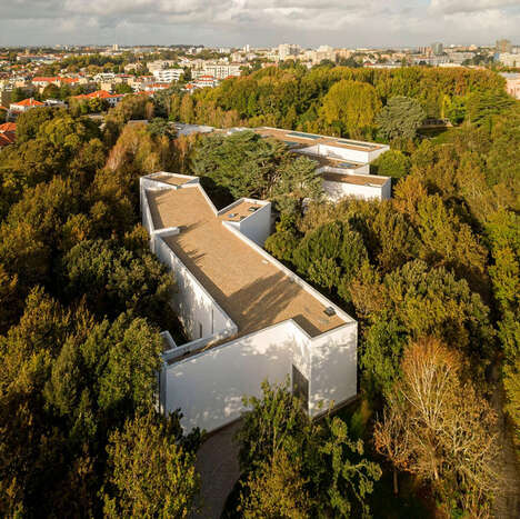 Geometric Three-Story Museum Expansions