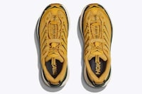 Dynamic Golden-Tinged Sneakers Image 4
