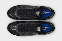 Glossy Stealthy Tonal Sneakers Image 1