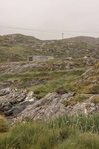 Local Stone-Clad Coastal Shelters Image 1