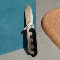 Foldout Kinetic Pocket Knives