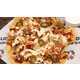 Meaty Topping-Rich Nachos Image 1