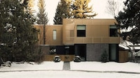 Wooden Screened Cantilevered Home Image 3